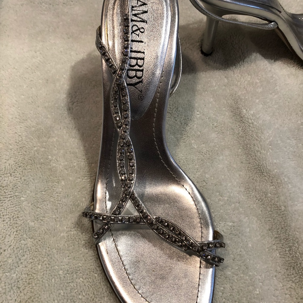 Evening silver stilettos with rhinestones
